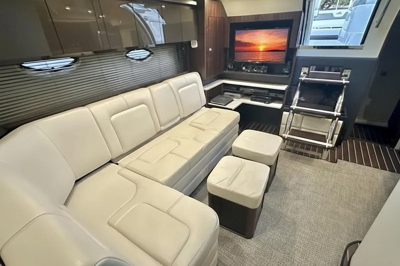 Slide: The Image of Luxurious interior of 2013 Monterey 400 Sport Yacht with plush seating and entertainment system. - 10