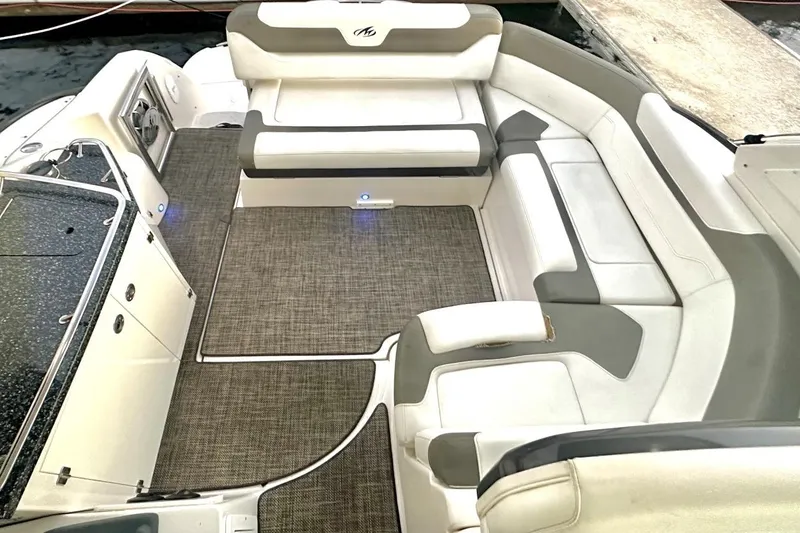 Slide: The Image of Luxurious seating area on a 2013 Monterey 400 Sport Yacht, featuring elegant upholstery. - 6