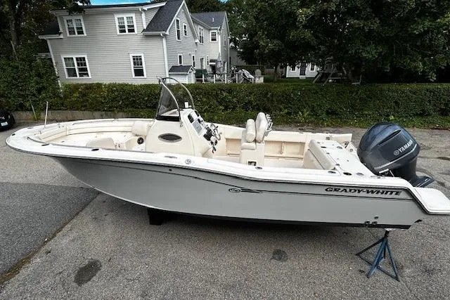 The Image of 2019 Grady-White Fisherman 236 boat with Yamaha engine, parked on a driveway. - 1