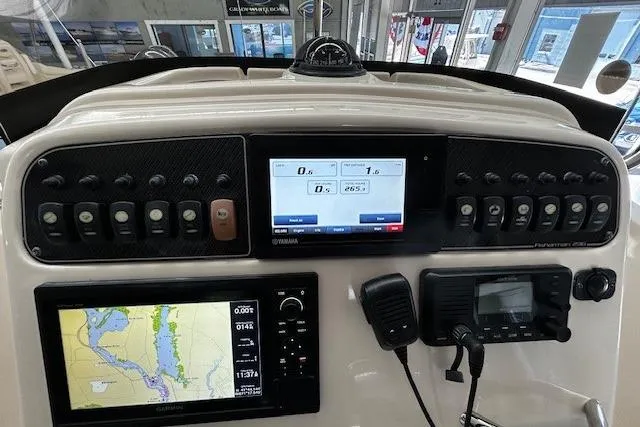 Slide: The Image of Control panel of 2019 Grady-White Fisherman 236 boat with navigation and communication equipment. - 8