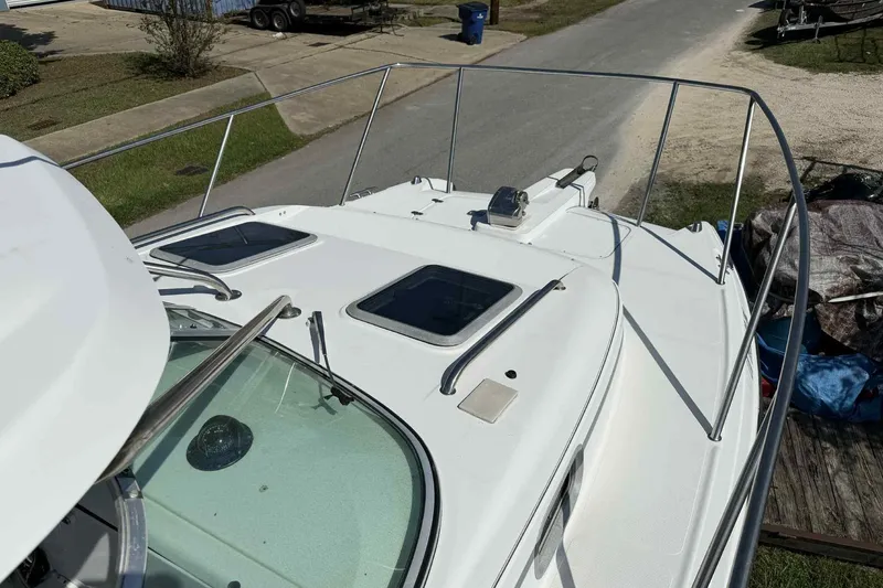 Slide: The Image of 2000 Glacier Bay 2670 Island Runner boat deck with railings and hatches. - 4