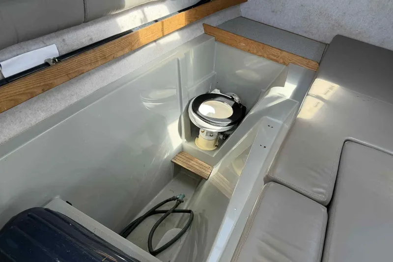 Slide: The Image of Interior of 2000 Glacier Bay 2670 Island Runner boat with compact marine toilet. - 5