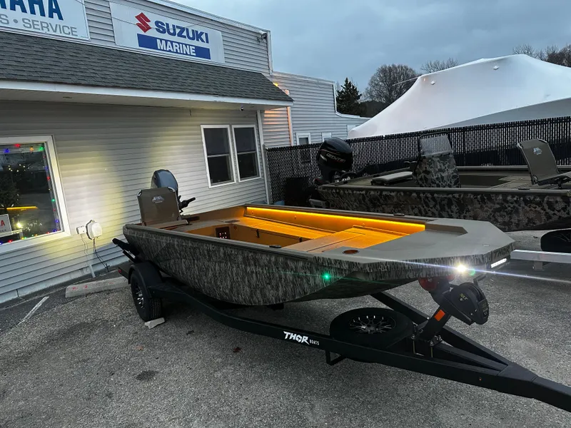 The Image of 2025 Thor 1754 Lake Hammer boat with illuminated interior at Suzuki Marine dealership. - 0