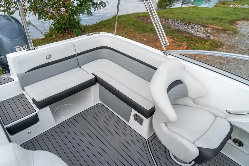 Slide: The Image of 2024 Hurricane SunDeck 217 OB boat interior with sleek seating and modern design. - 20