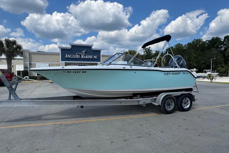 The Image of 2025 Key West 203 DFS boat on trailer at Anglers Marine NC dealership. - 0