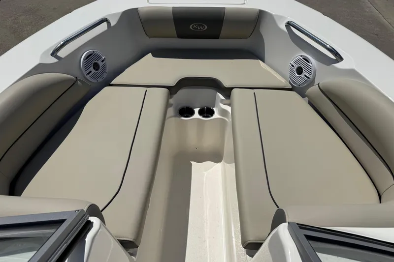 Slide: The Image of Interior of 2025 Key West 203 DFS boat with cushioned seating and speakers. - 14