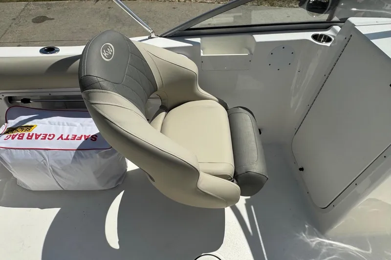 Slide: The Image of 2025 Key West 203 DFS boat interior with safety gear bag and cushioned seat. - 15