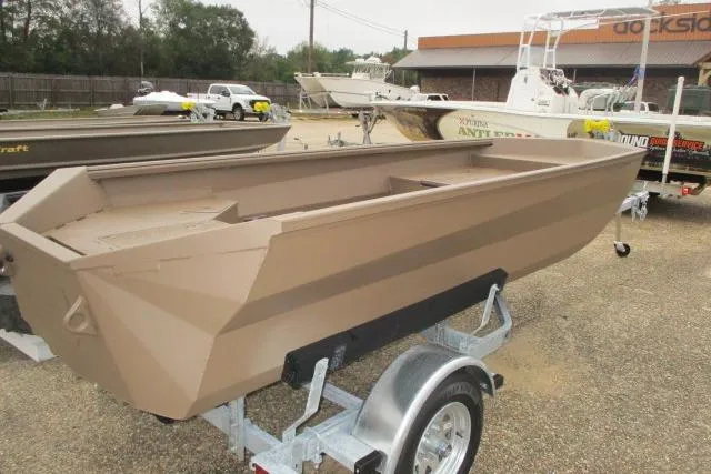 Slide: The Image of 2026 Reaper Boats 550-1691 model on trailer, displayed outdoors. - 4