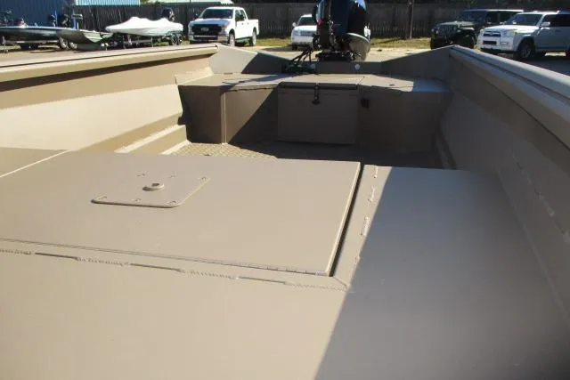 Slide: The Image of 2026 Reaper Boats 550-1691 model, beige interior, open deck view. - 8