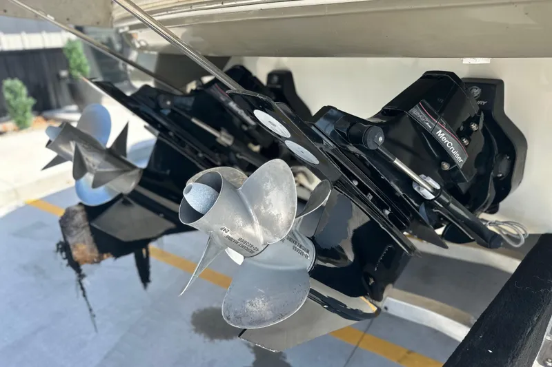 Slide: The Image of 2007 Sea Ray 290 SLX boat propellers and MerCruiser engine detail. - 12