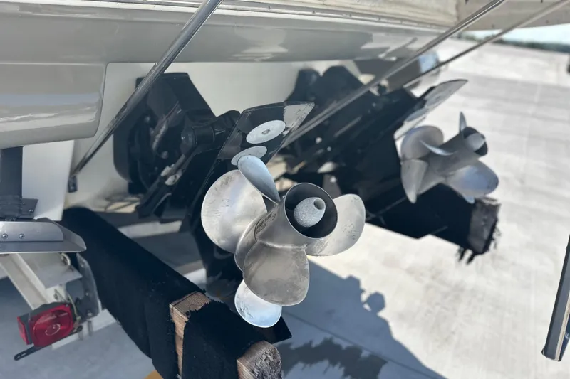 Slide: The Image of Close-up of 2007 Sea Ray 290 SLX boat propellers on a trailer. - 13