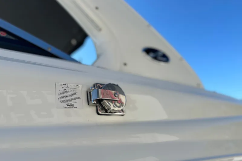 Slide: The Image of Close-up of 2007 Sea Ray 290 SLX boat detail against clear blue sky. - 17
