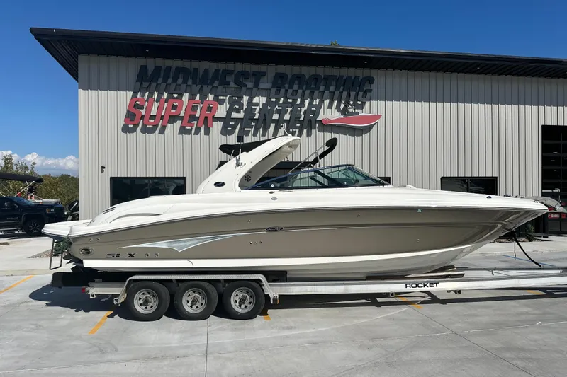 Slide: The Image of 2007 Sea Ray 290 SLX boat on trailer at Midwest Boating Super Center. - 25