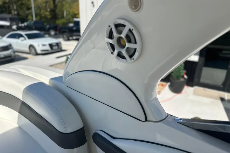 Slide: The Image of 2007 Sea Ray 290 SLX boat interior with speaker and seating detail. - 66