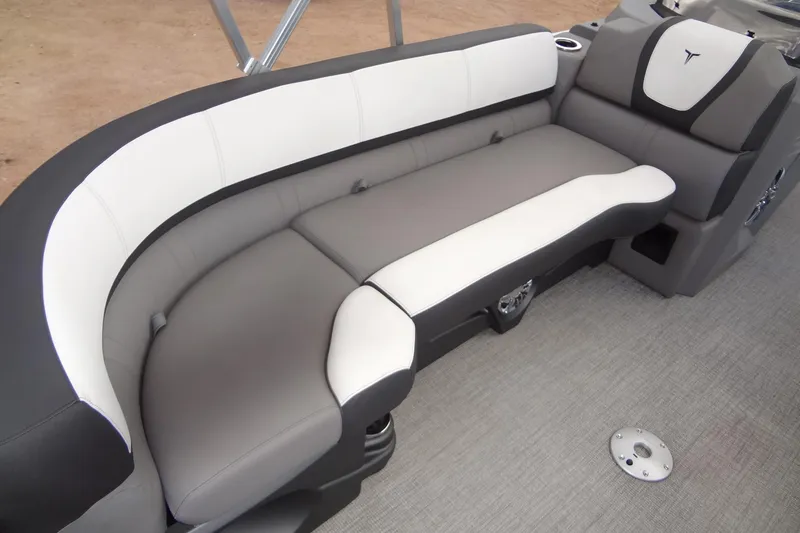 Slide: The Image of 2024 Tahoe Pontoon 2585 VRL boat interior with stylish gray and white seating. - 11