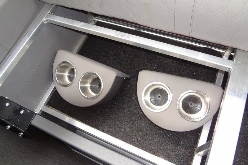 Slide: The Image of 2024 Tahoe Pontoon 2585 VRL cup holders under seat, showcasing sleek design. - 19