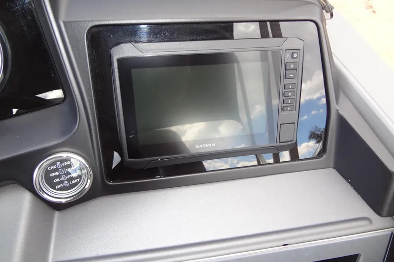 Slide: The Image of Dashboard of 2024 Tahoe Pontoon 2585 VRL featuring a Garmin display. - 28