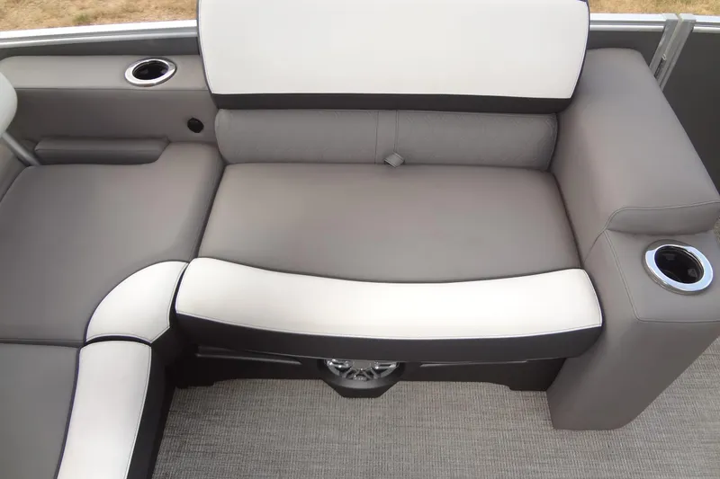 Slide: The Image of 2024 Tahoe Pontoon 2585 VRL interior seating with cup holders and modern design. - 31