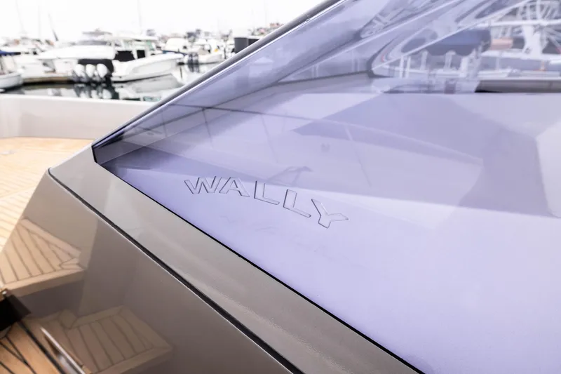 Slide: The Image of 2005 Wally Yachts Tender Express with sleek design, docked at marina. - 11