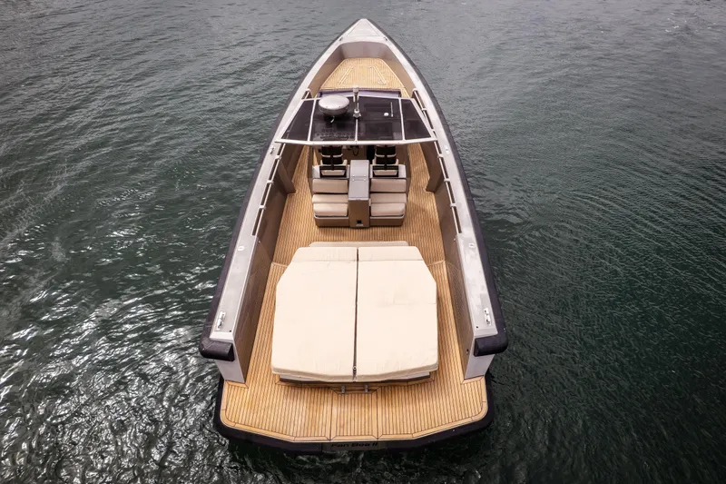 Slide: The Image of 2005 Wally Yachts Tender Express on water, featuring sleek design and spacious deck. - 3