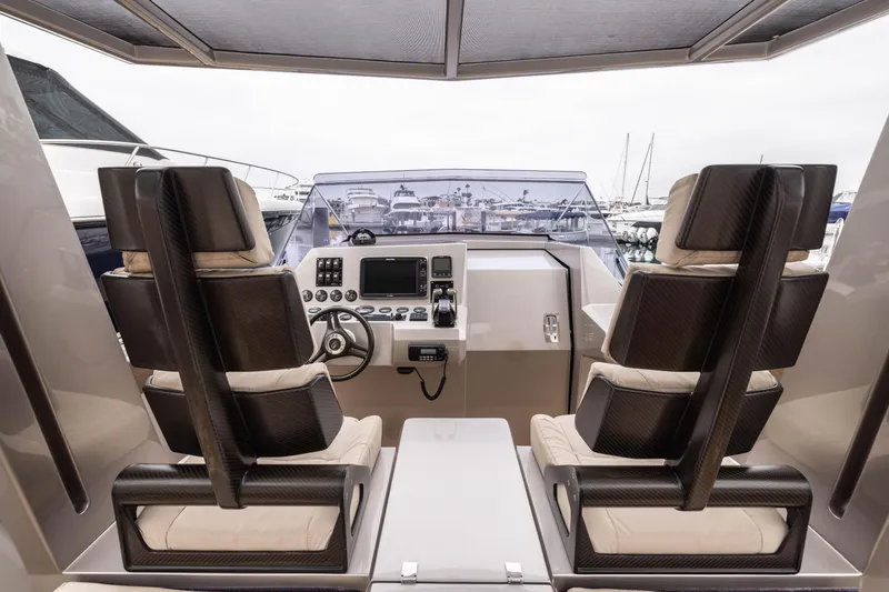 Slide: The Image of Interior of 2005 Wally Yachts Tender Express with modern helm and seating. - 8