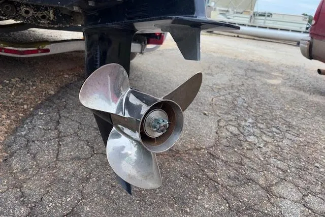 Slide: The Image of Propeller of 2011 NauticStar 210 Coastal boat on a trailer. - 11