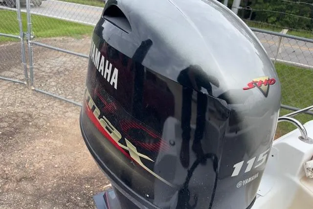 Slide: The Image of Yamaha VMAX 115 outboard motor on 2011 NauticStar 210 Coastal boat. - 9