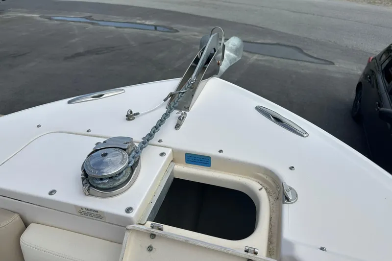 Slide: The Image of Bow of 2012 Grady-White Freedom 275 boat with anchor and chain mechanism. - 14
