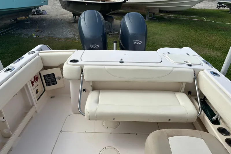 Slide: The Image of 2012 Grady-White Freedom 275 boat interior with Yamaha 150 engines. - 37