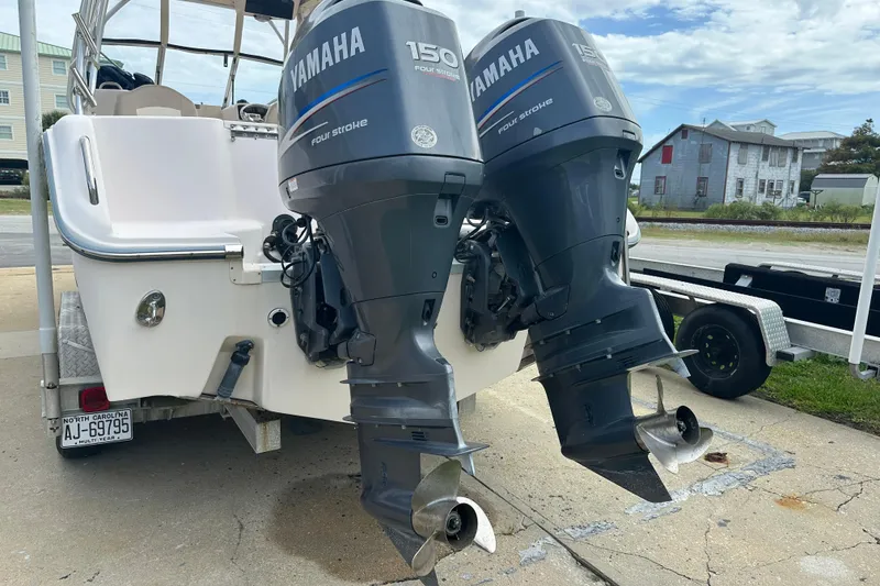 Slide: The Image of 2012 Grady-White Freedom 275 boat with dual Yamaha 150 four-stroke engines. - 5