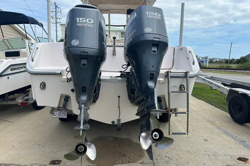 Slide: The Image of 2012 Grady-White Freedom 275 boat with twin Yamaha 150 four-stroke engines. - 6