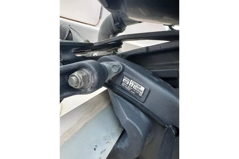 Slide: The Image of Close-up of a 2012 Grady-White Freedom 275 boat engine component. - 8