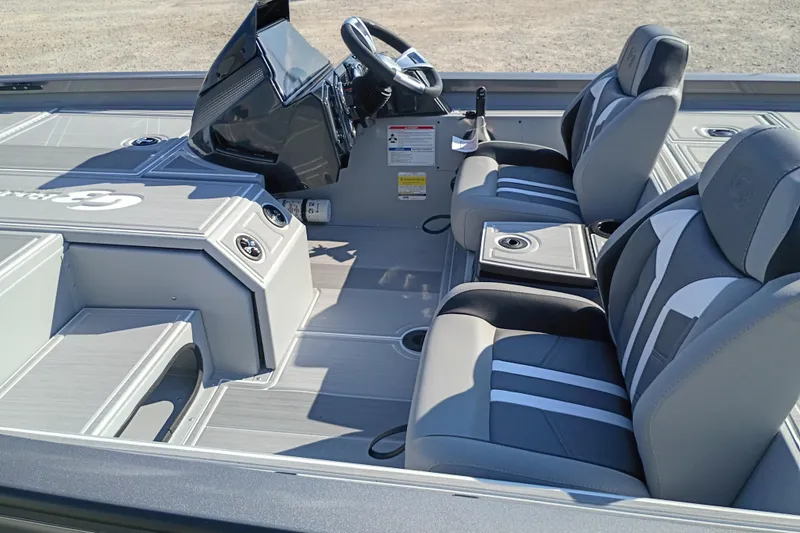Slide: The Image of Interior of 2026 G3 1710SE boat with modern seating and steering console. - 5