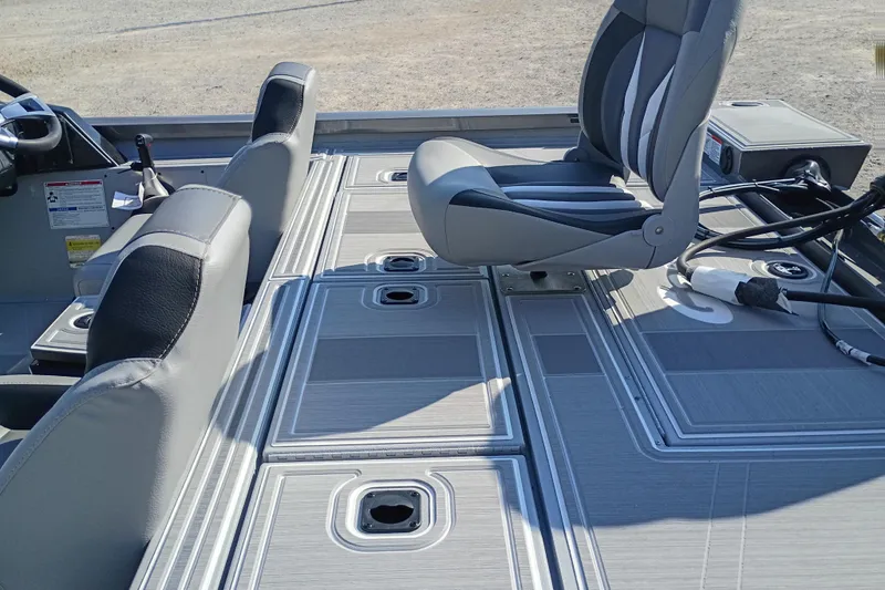 Slide: The Image of Interior of 2026 G3 1710SE boat with gray seating and deck. - 6