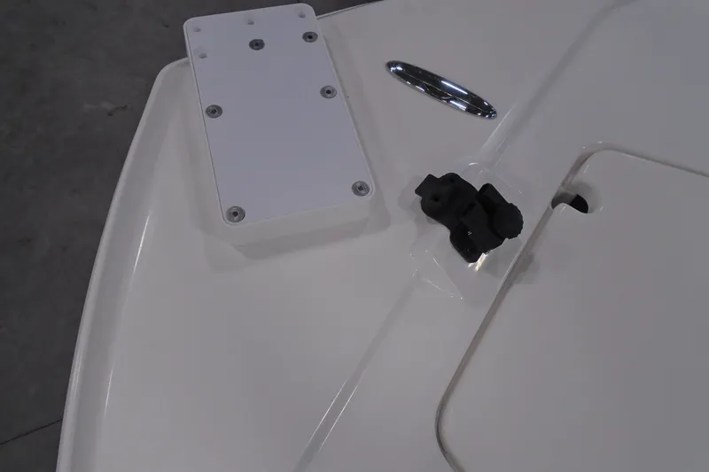 Slide: The Image of 2026 Caymas 24 HB boat deck detail with mounted components. - 25