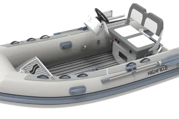 The Image of 2026 Highfield CL340 FCT inflatable boat with seating and steering console, featuring a sleek design. - 1