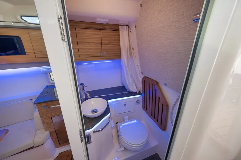 Slide: The Image of Luxurious bathroom interior of 2020 Boston Whaler 380 Realm boat with modern amenities. - 20