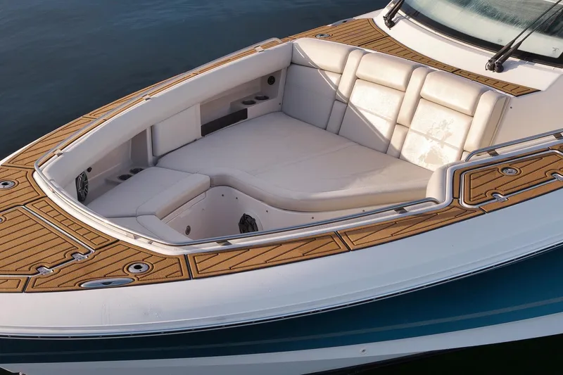 Slide: The Image of 2020 Boston Whaler 380 Realm boat with cushioned seating and teak deck accents. - 7