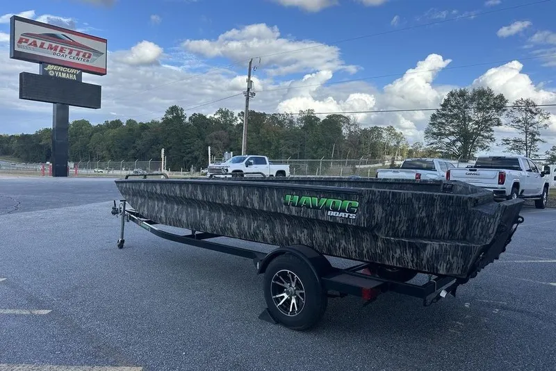 Slide: The Image of 2025 Havoc 1860 boat on trailer at Palmetto Boat Center parking lot. - 8