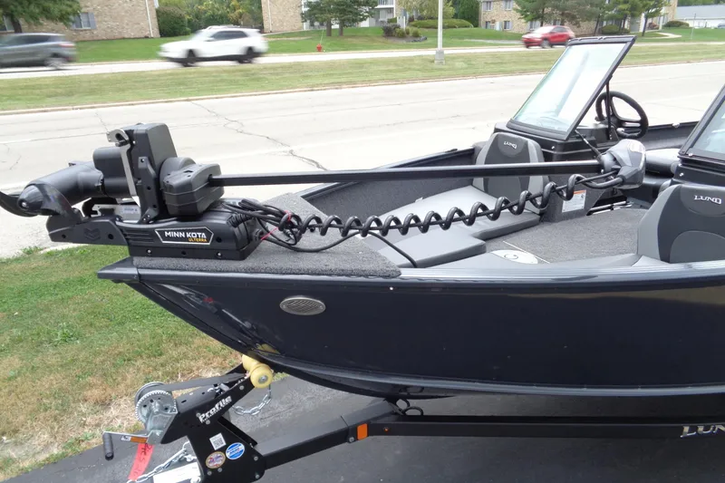 Slide: The Image of 2026 Lund 1775 Adventure Sport boat with Minn Kota trolling motor on trailer. - 4