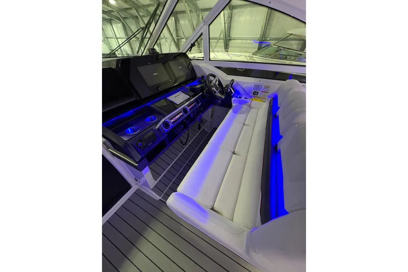 Slide: The Image of 2023 Formula 400 Super Sport Crossover cockpit with modern controls and luxurious seating. - 11