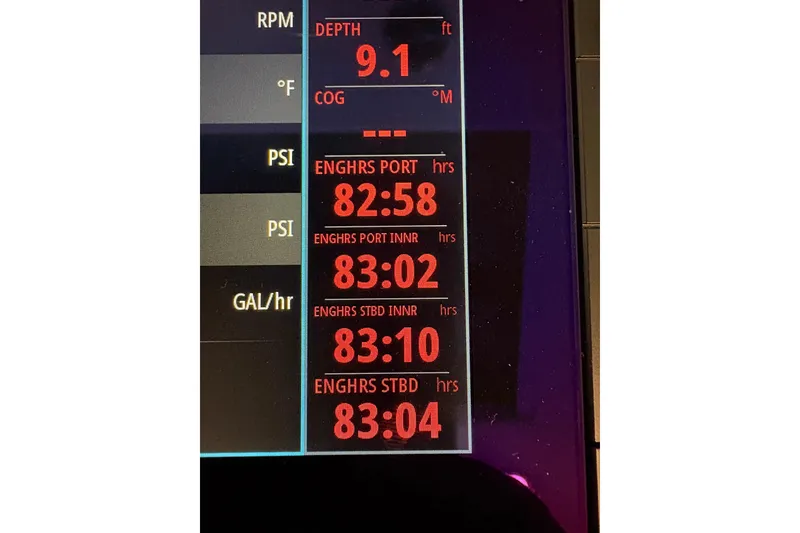 Slide: The Image of Dashboard display of 2023 Formula 400 Super Sport Crossover engine hours and depth. - 12