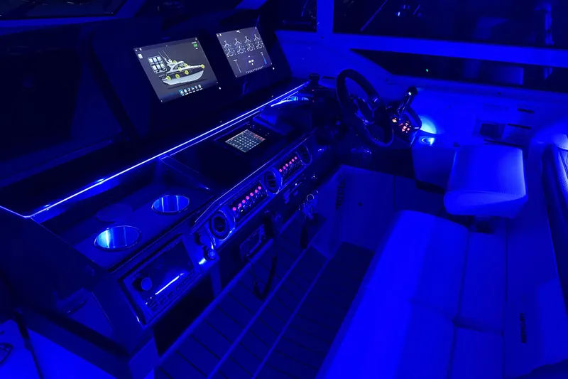 Slide: The Image of 2023 Formula 400 Super Sport Crossover cockpit with illuminated controls and modern displays. - 14