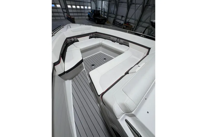 Slide: The Image of 2023 Formula 400 Super Sport Crossover boat interior with sleek seating and modern design. - 22