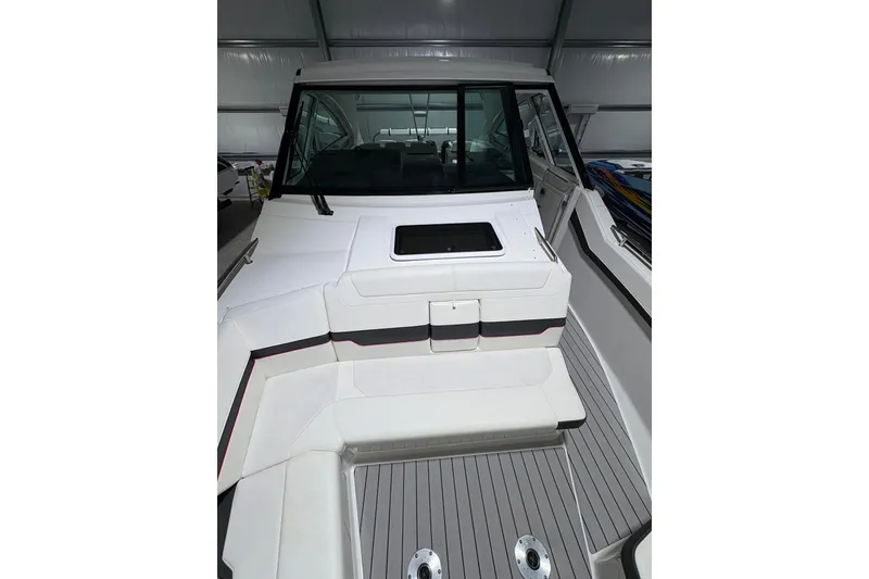 Slide: The Image of 2023 Formula 400 Super Sport Crossover boat interior with sleek seating and modern design. - 23