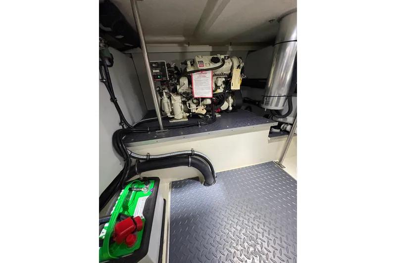 Slide: The Image of Engine room of 2023 Formula 400 Super Sport Crossover with visible machinery and components. - 41