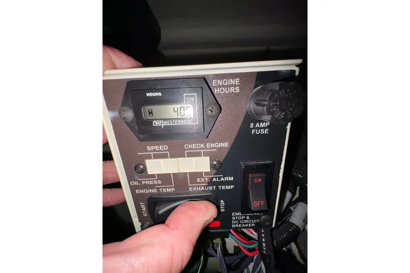 Slide: The Image of Control panel of a 2023 Formula 400 Super Sport Crossover with engine hour display. - 42