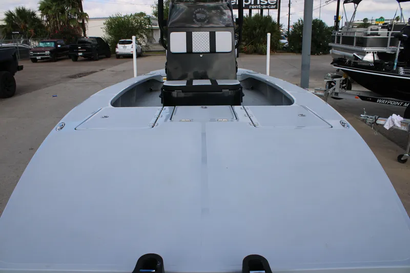 Slide: The Image of 2026 Freedom Boats 23' Warrior on trailer, featuring Suzuki outboard motor. - 2