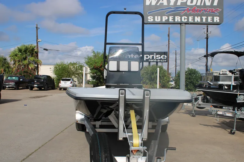 Slide: The Image of 2026 Freedom Boats 23' Warrior interior with dual cushioned seats and control panel. - 9