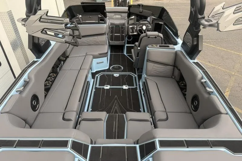 Slide: The Image of Luxurious interior of 2025 Supra SL 575 boat with sleek seating and modern design. - 10